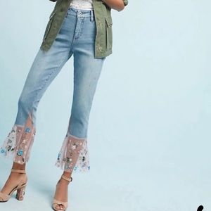 Light wash jeans with floral sequin trim